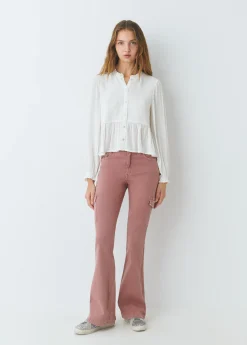 Blusa smock con botones plumeti