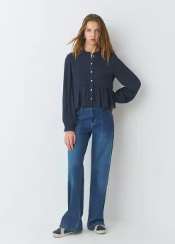 Blusa smock con botones plumeti