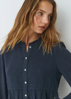Blusa smock con botones plumeti
