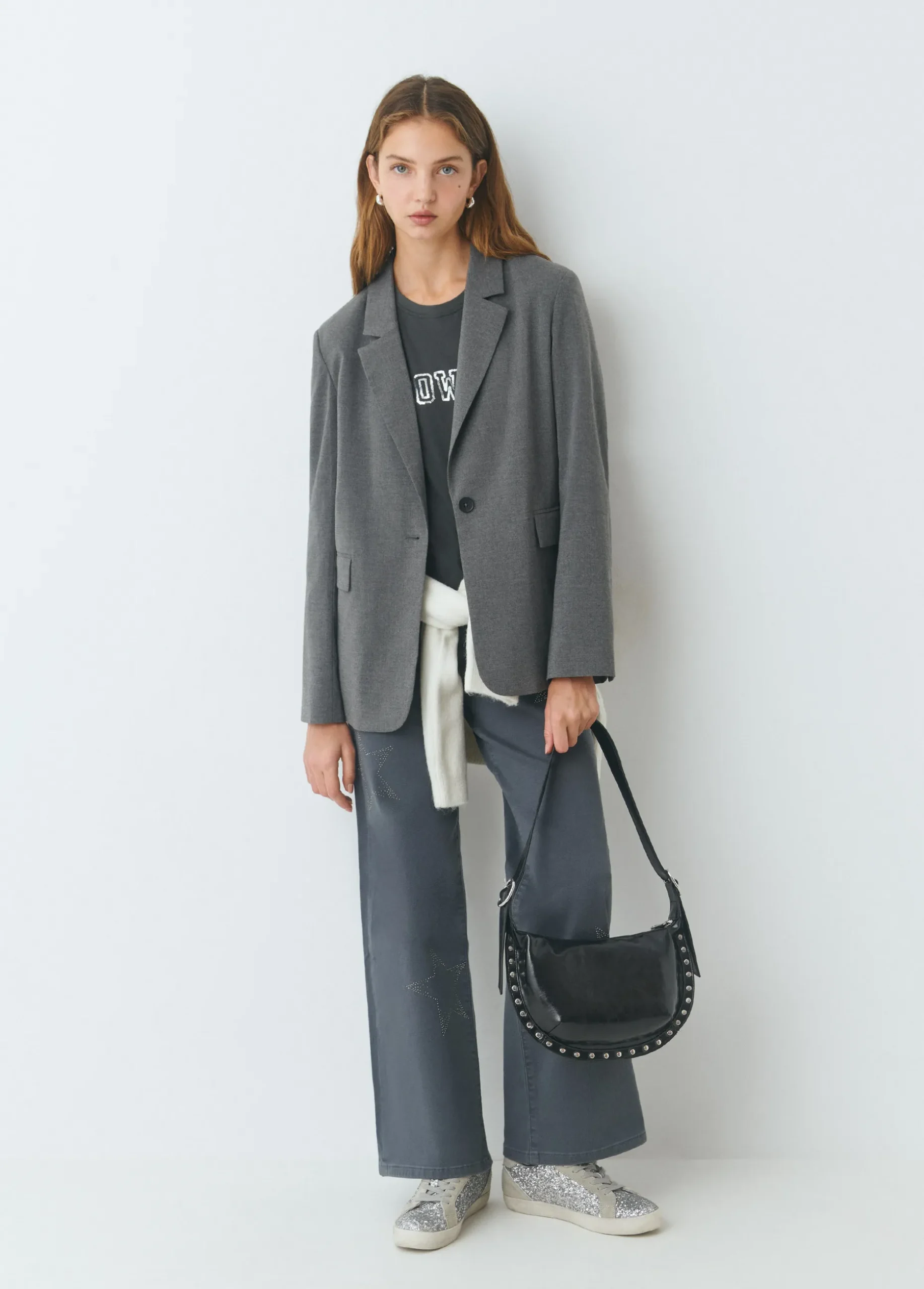 Bolso bandolera tachas