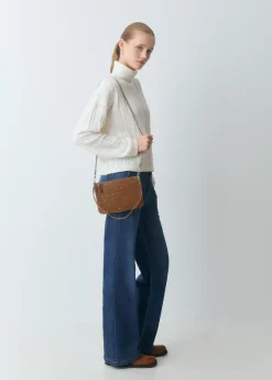 Bolso piel tachitas