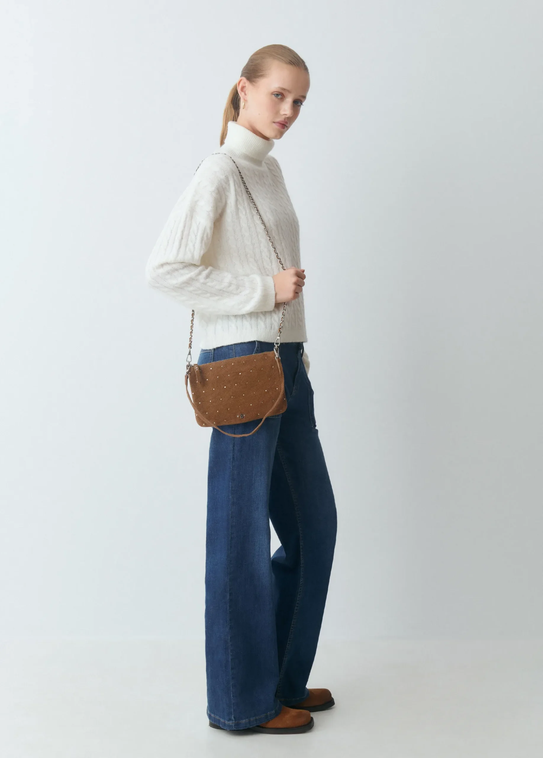 Bolso piel tachitas