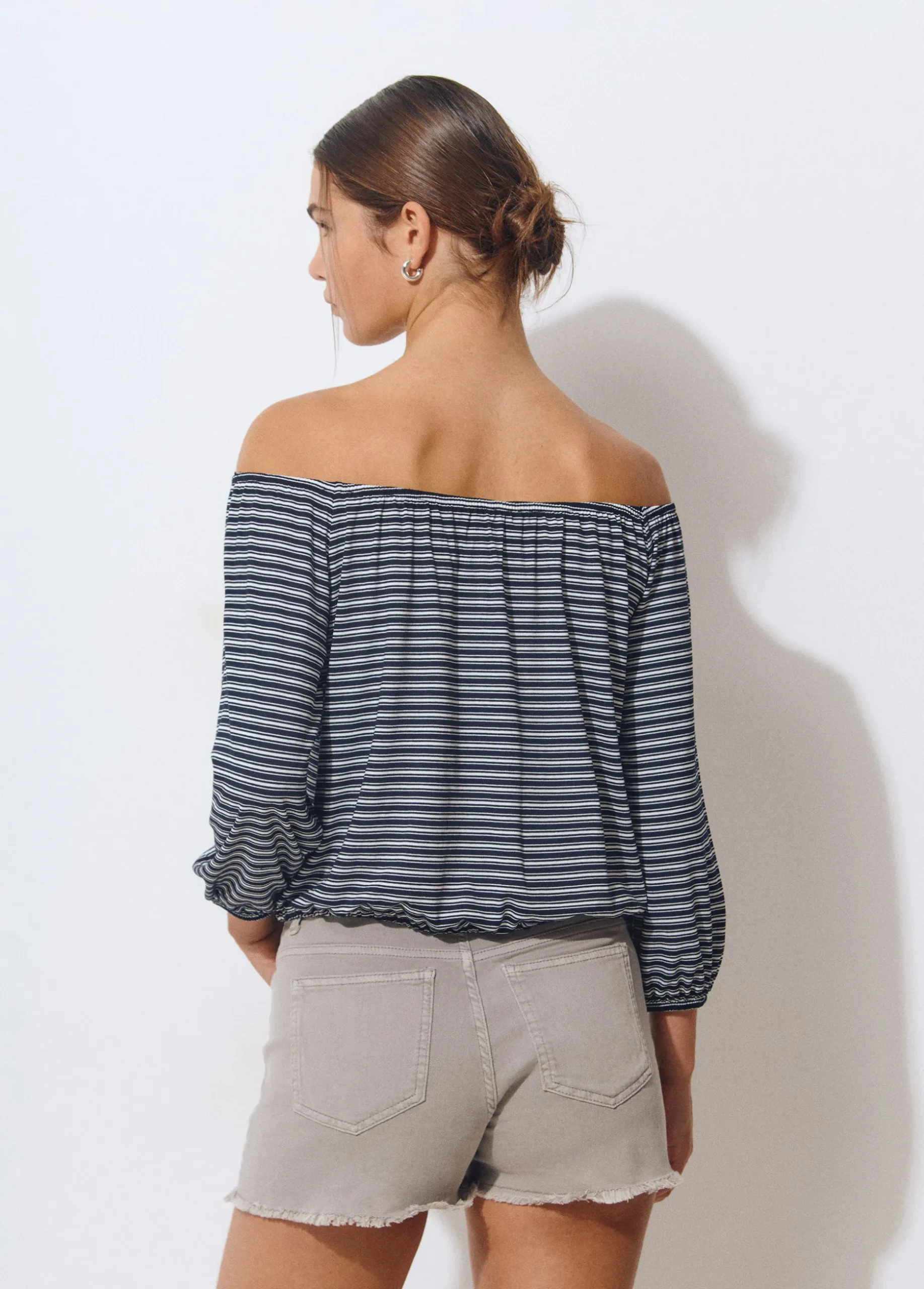 Camiseta escote bardot raya tejida