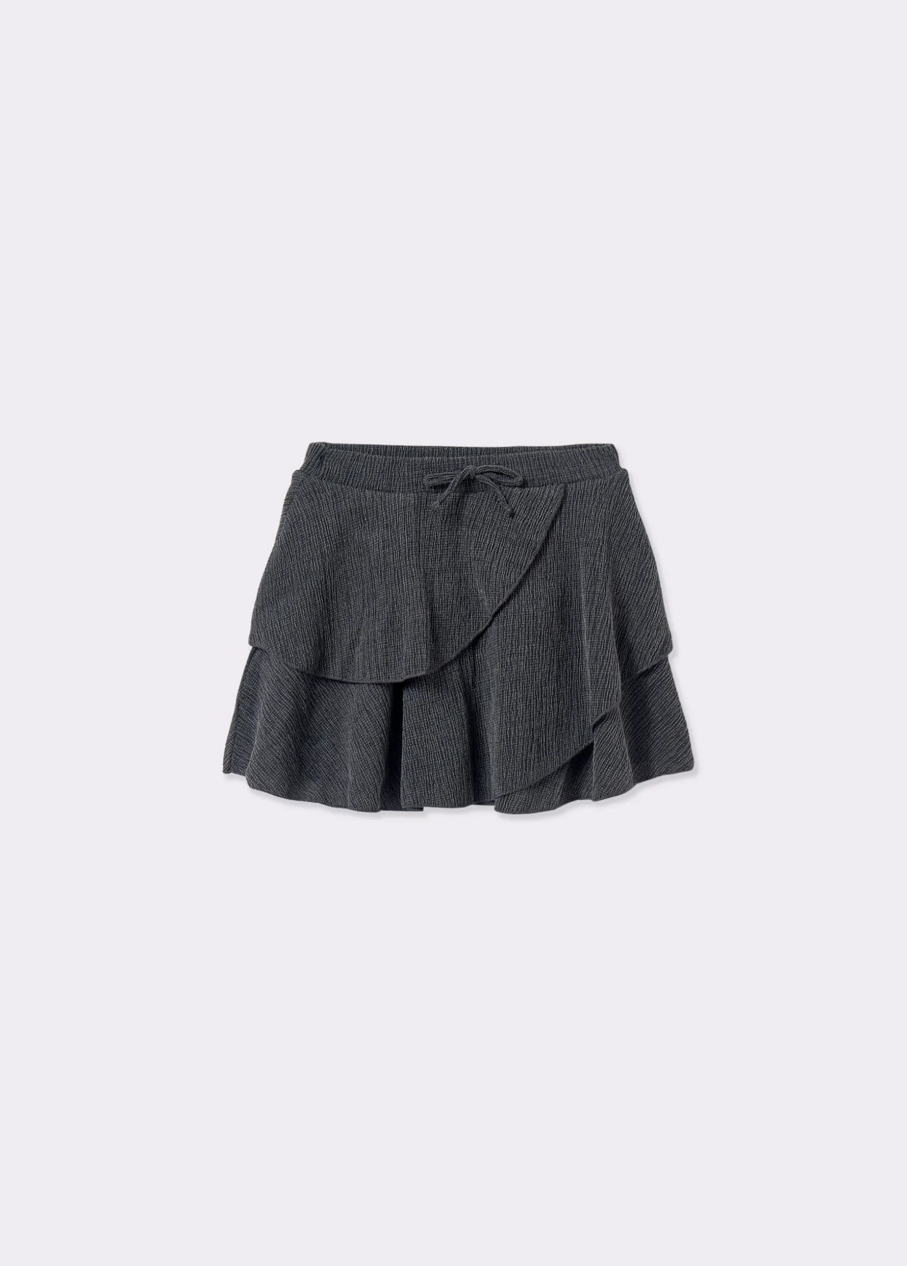 Falda corta volantes tejido estructura