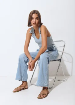Jeans culotte tachas