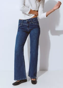 Jeans culotte tachas