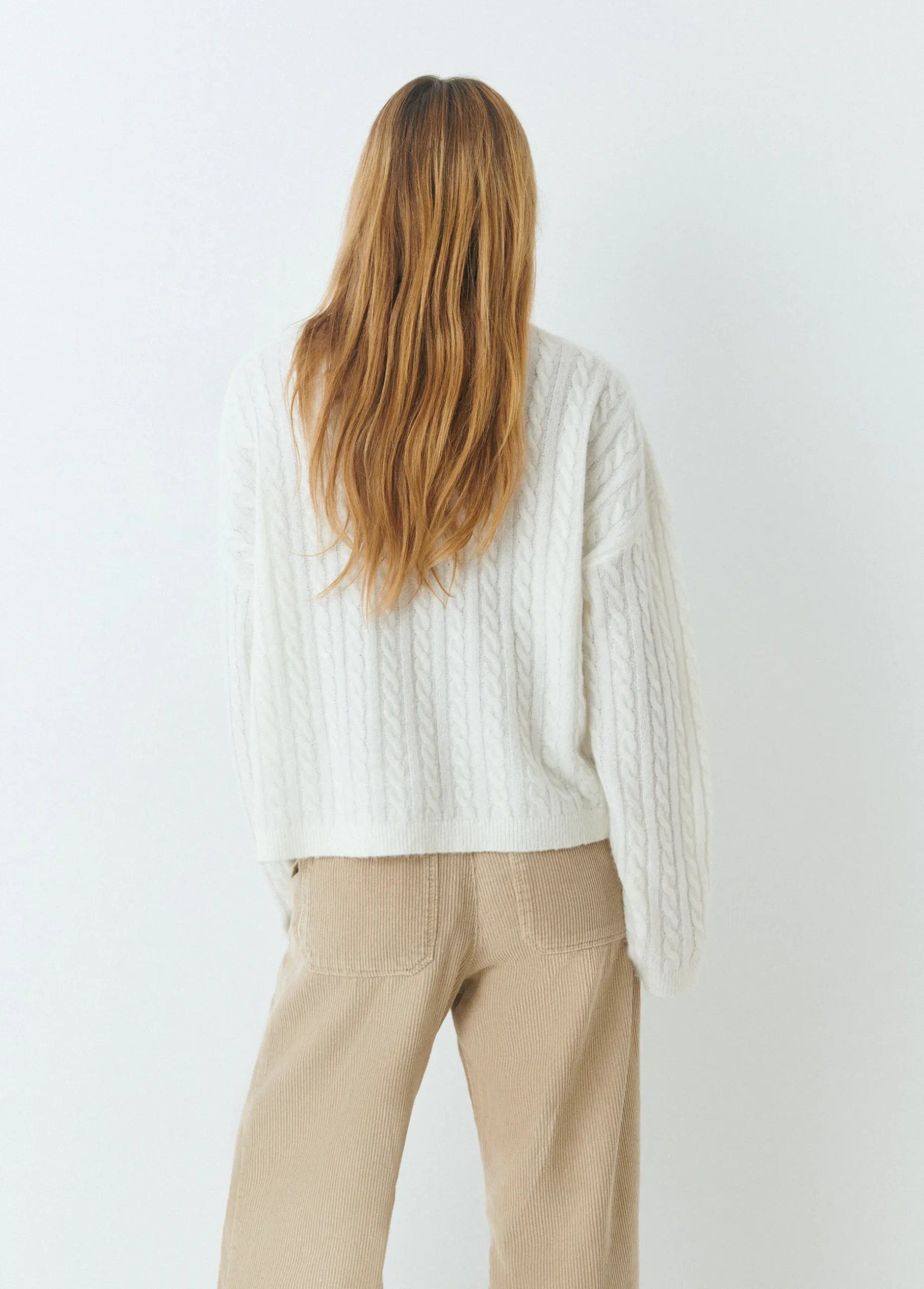 Jersey cuello alto trenzas