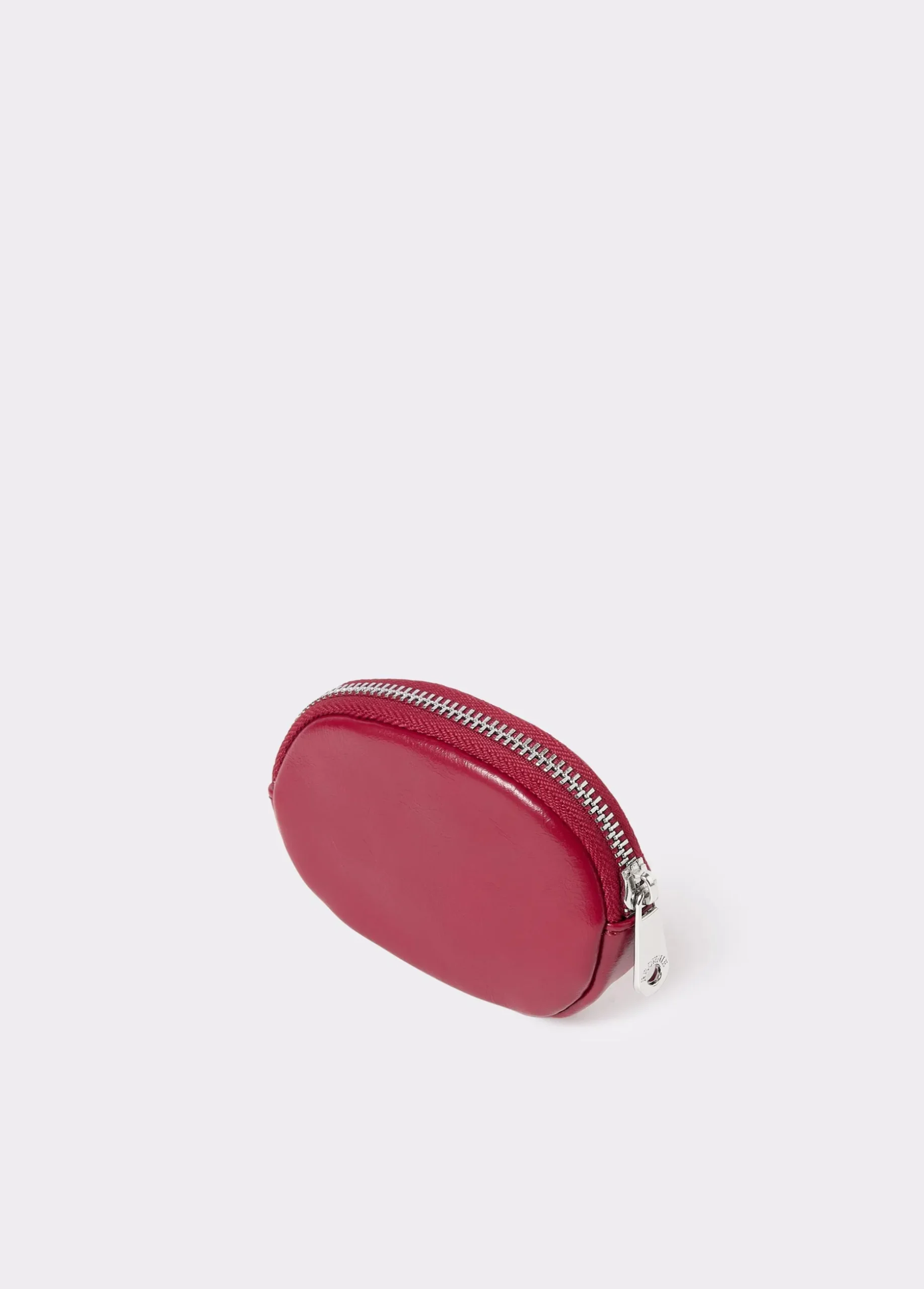 Monedero redondo tachas